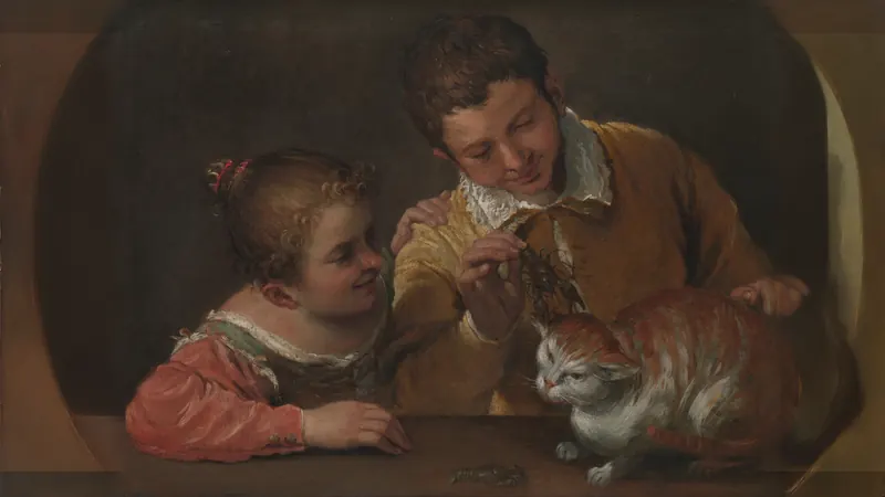 Zwei Kinder, die eine Katze ärgern von Annibale Carracci